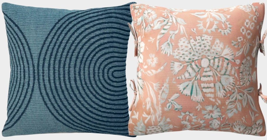 a blue modern style throw pillow and a peach and tan floral throw pillow