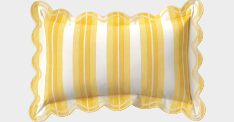a yellow stripe scalloped edge throw pillow
