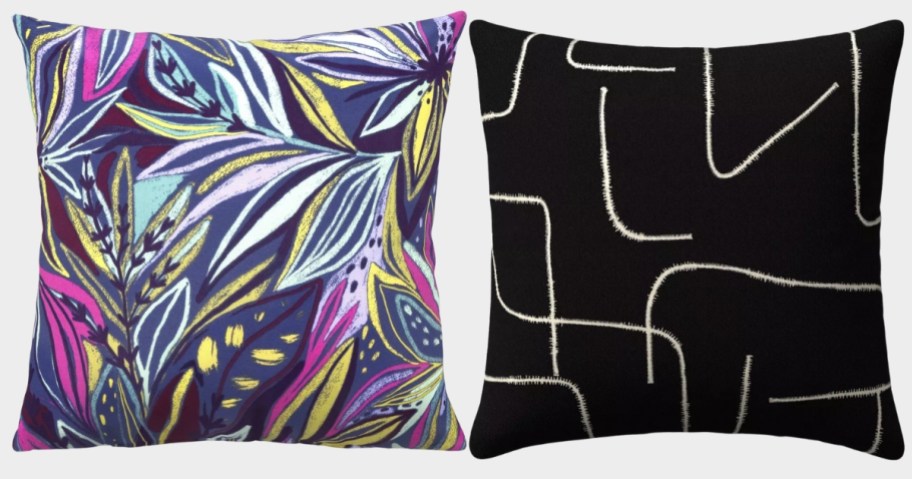 a colorful leaf print throw pillow and a black and white abstract throw pillow