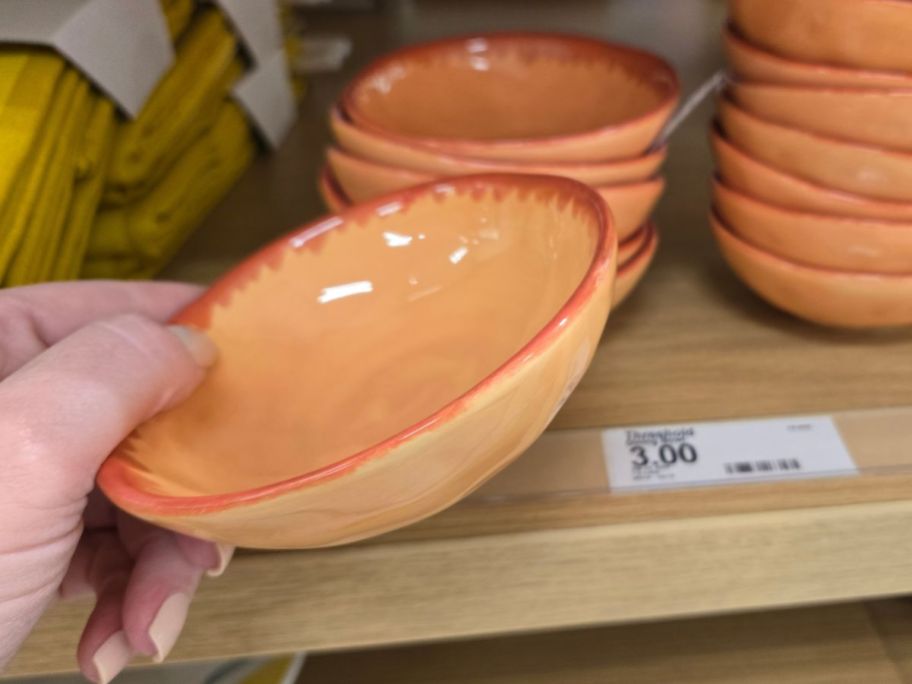 peach colored Threshold Stoneware Mini Bowl in hand in store