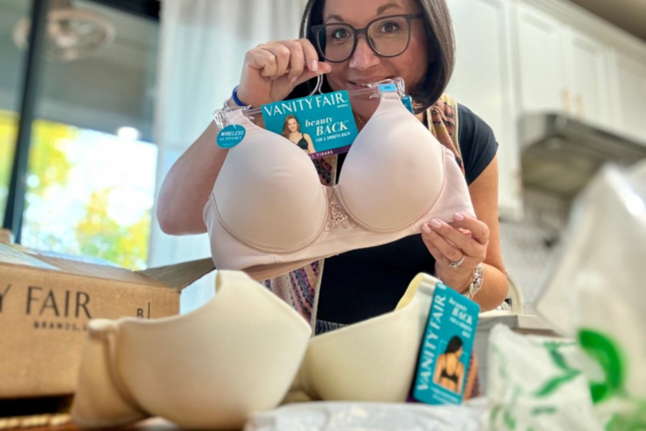 woman holding up bra