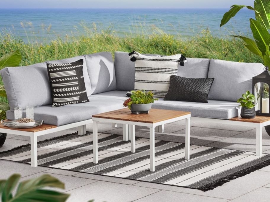 Patio with a Mainstays Oakleigh Chaise Sectional Couch and table