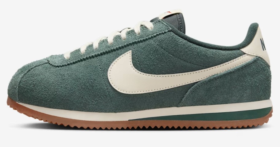 green and white Nike women's Cortez style shoe