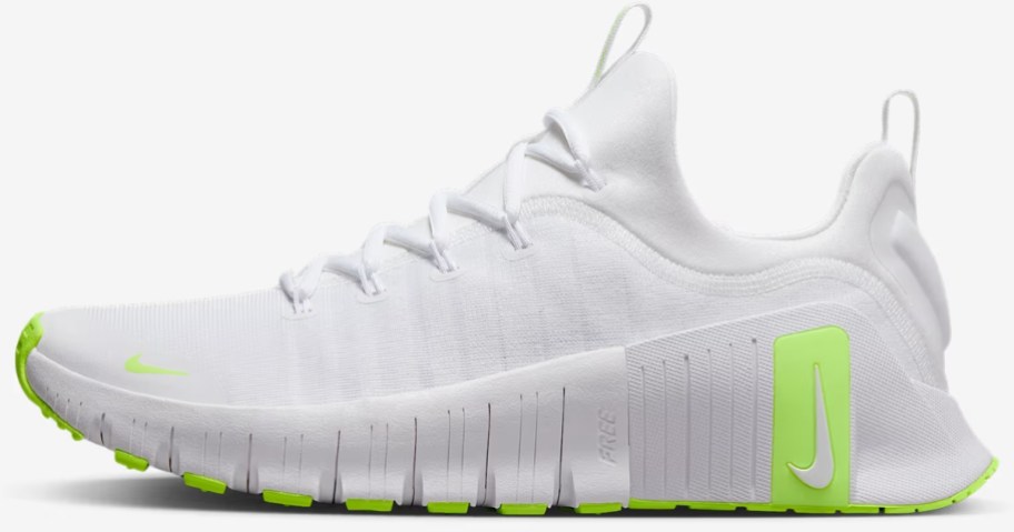 white and yellow men's Nike running shoe