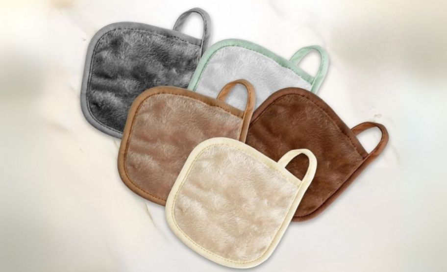5 makeup remover towels in various earth tones