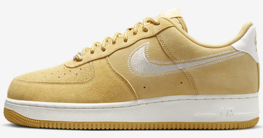 yellow and white Nike Air Force 1 style shoes