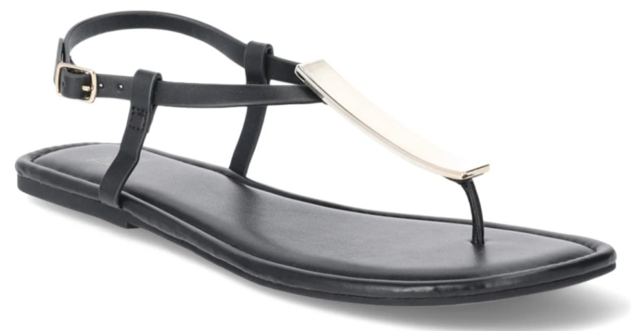 a women's black and white strappy sandal