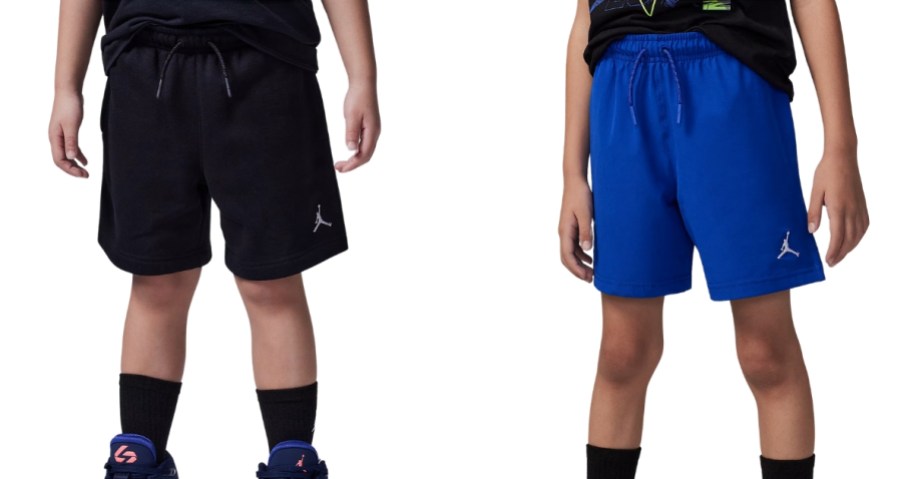 lower half of 2 boys wearing Nike Jordan shorts