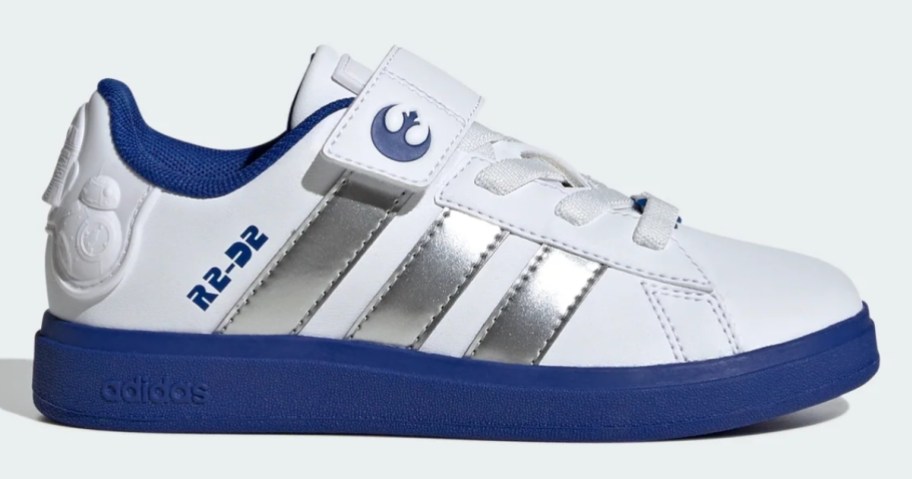 a white, blue, and silver adidas kids shoe