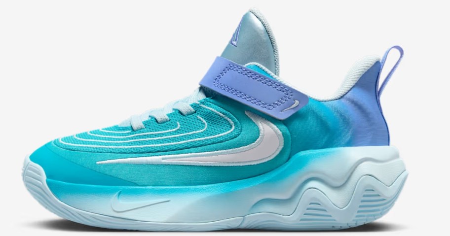 a blue and teal kids Nike shoe