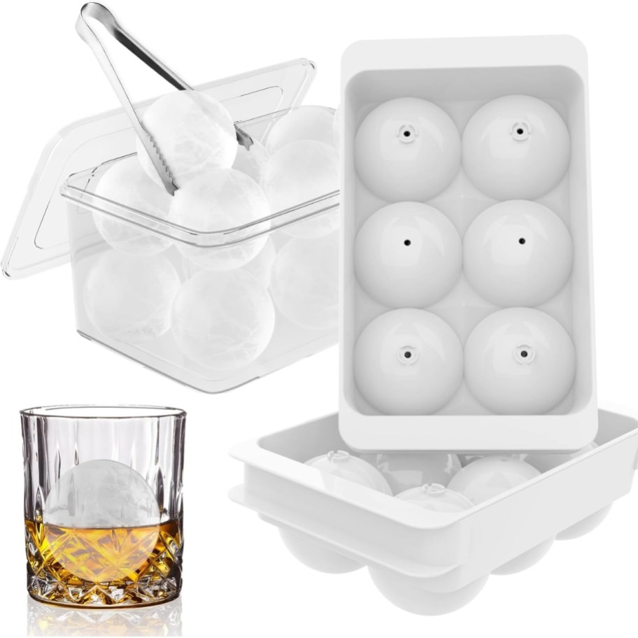 a set of round ice cube trays with a bin and tongs next to a glass with one in it