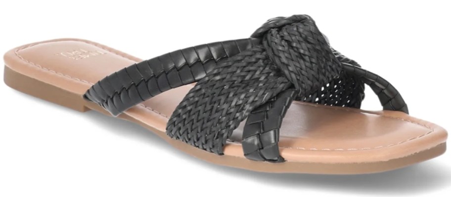 a women's sandal with a black knot strap