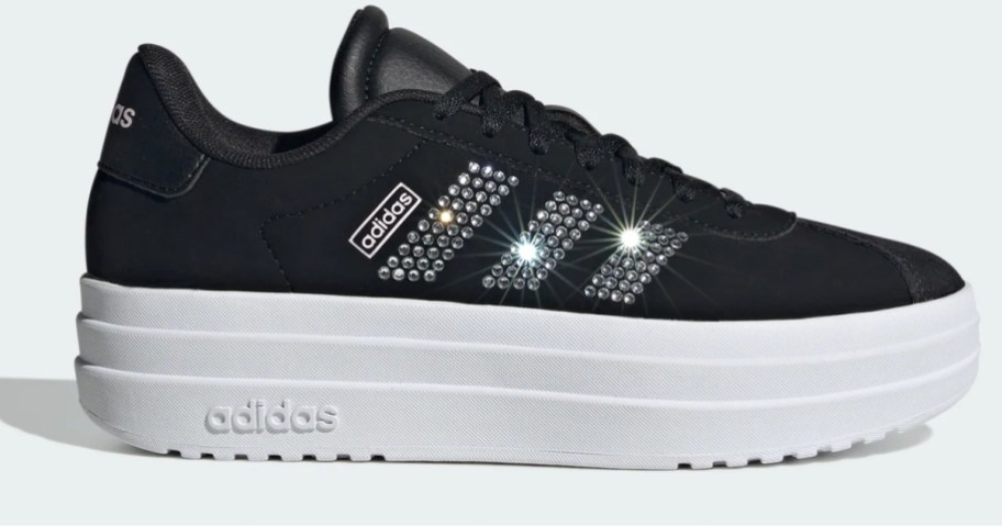 a black and white adidas kids platform sneaker