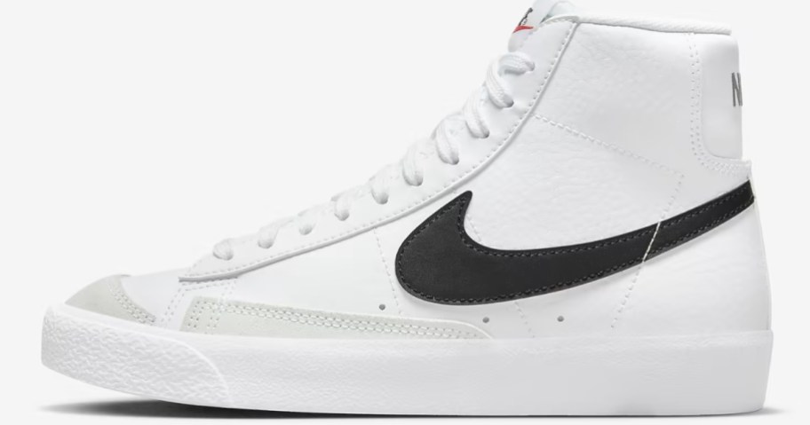 a kids white and black Nike Blazer style shoe