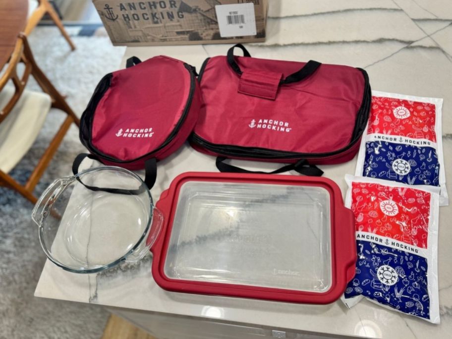 Display of all the achor bakeware you are getting including the two totes and ice packs