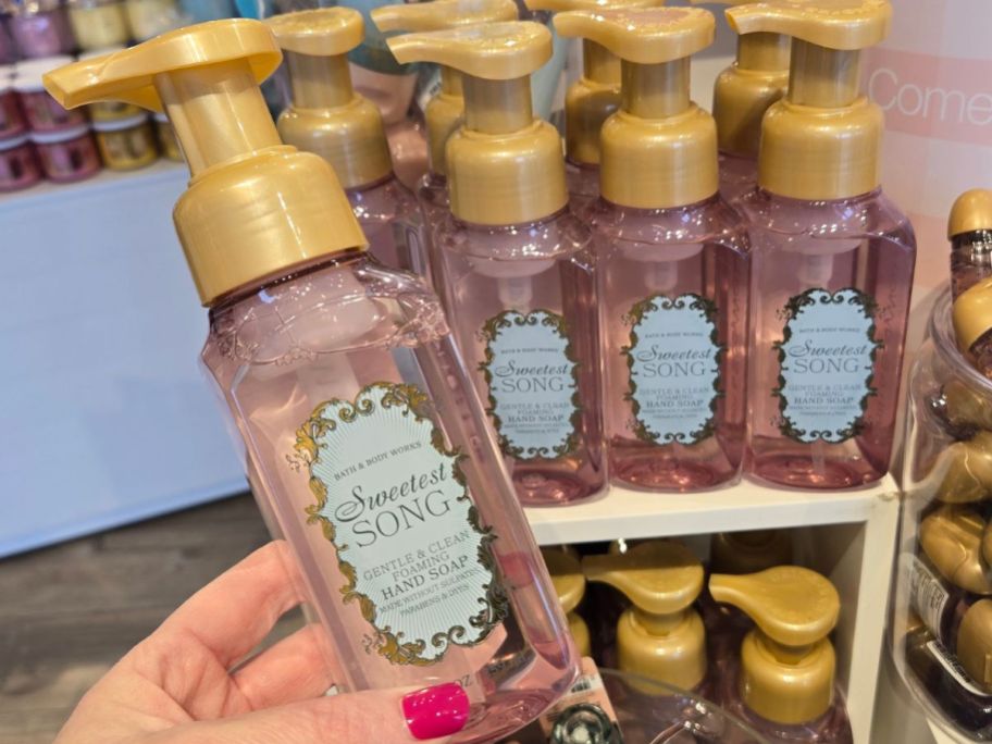 Hand holding a Bath & Body Works The Sweetest Song Foaming Hand Soap
