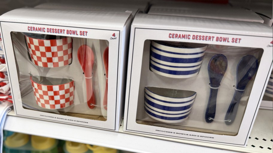 red and blue dessert bowl and spoon sets on store shelf