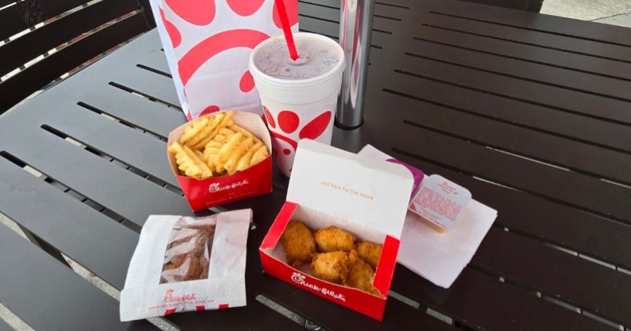 A table with Cjik-Fil-A menu items on it