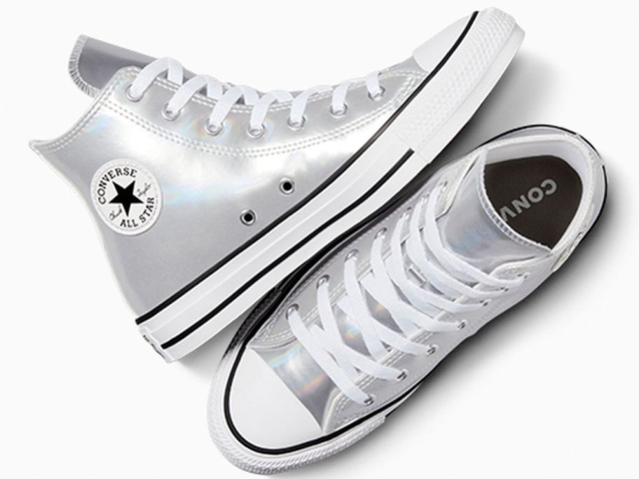A pair of silver Converse sneakers