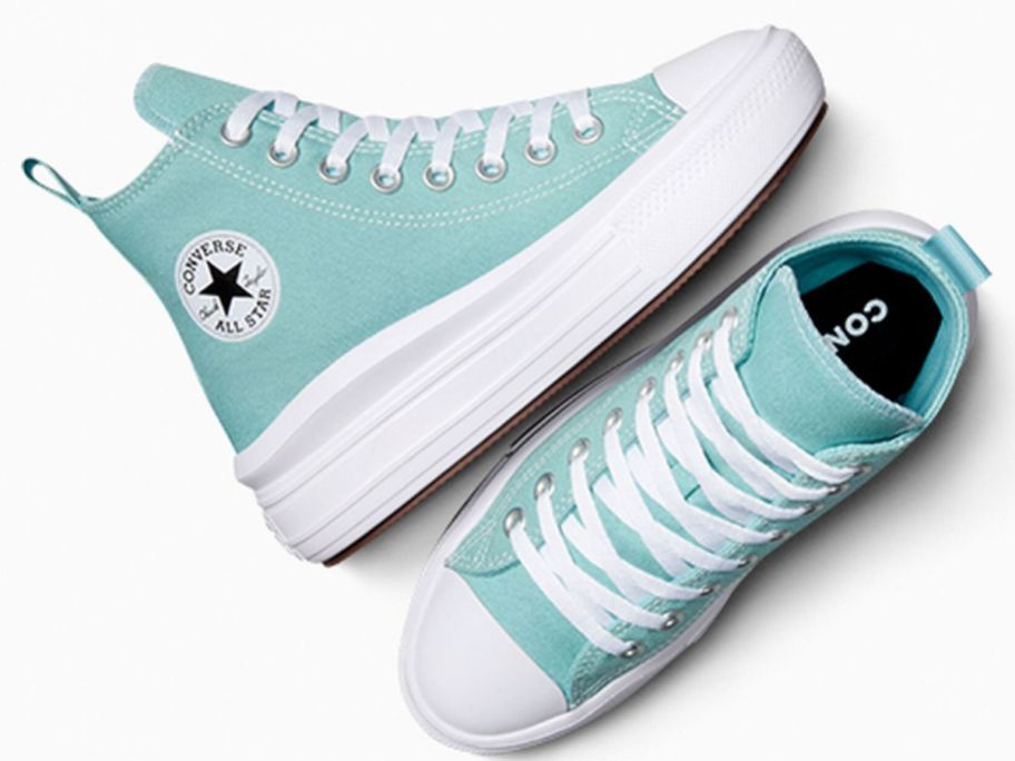 A pair of teal Converse sneakers