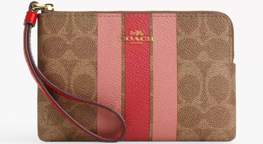 brown coach wristlet with pink stripes