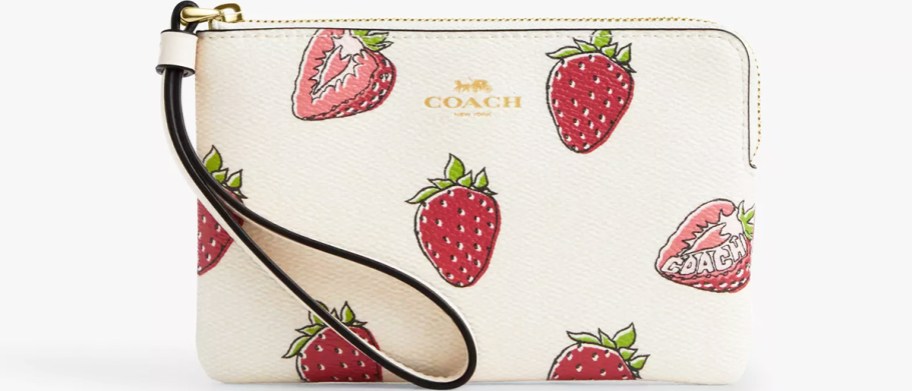 white coach wristlet with strawberry print