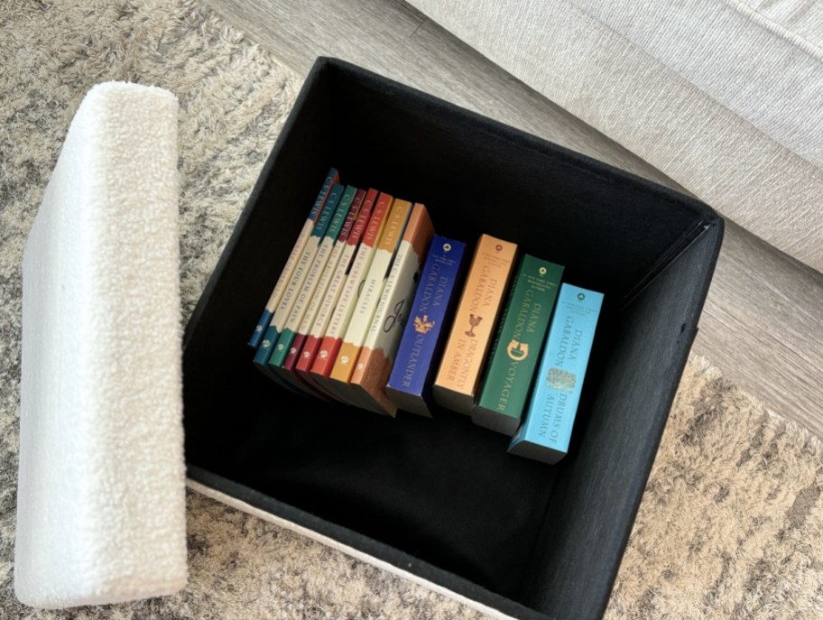 A collapsible storage ottoman from Walmart, one of our Walmart college dorm room ideas