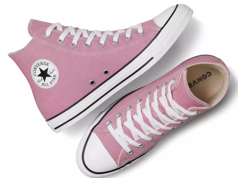 A pair of pink Converse sneakers