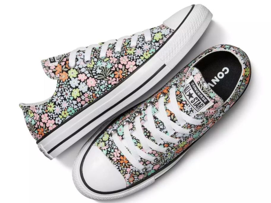 A pair of floral Converse sneakers