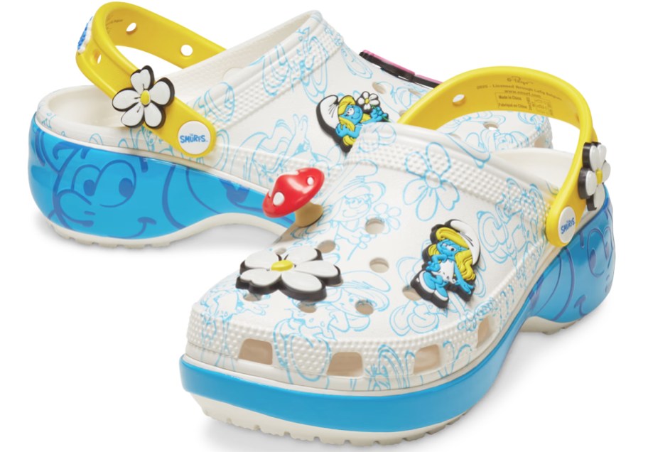 blue, white, and yellow platform crocs with smurfs charms