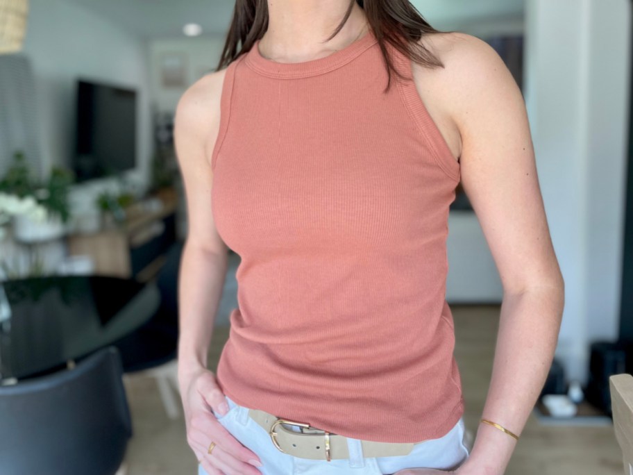 Woman wearing pink Sonoma goods for life tank top with a belt