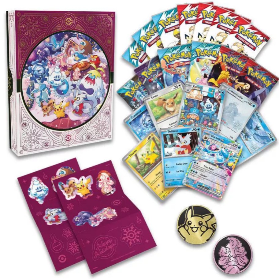 cards, papers, and a box for the 2025 Pokémon Trading Card Game: Holiday Calendar