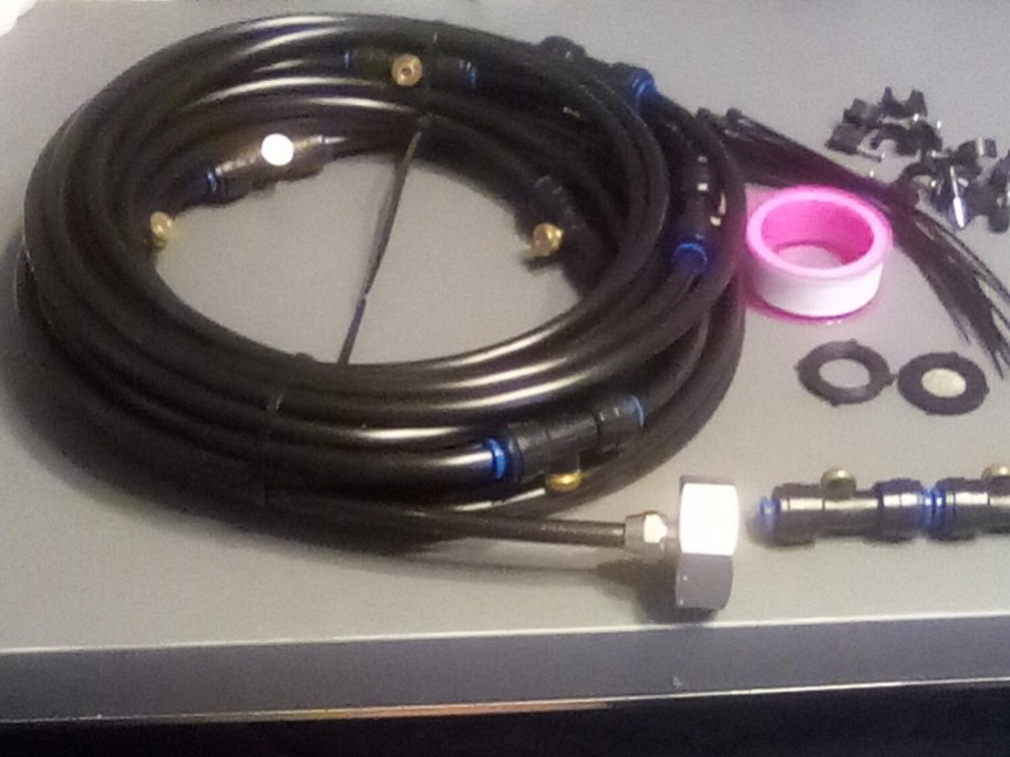 a misting line hose and connectors on a table