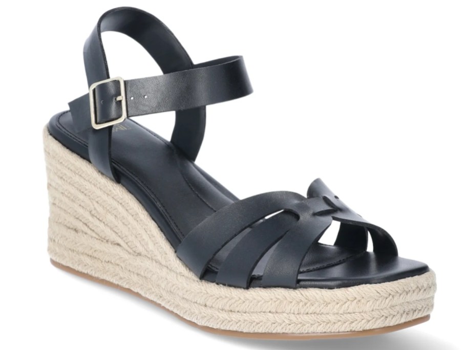 a women's black and raffia platform espadrille style sandal