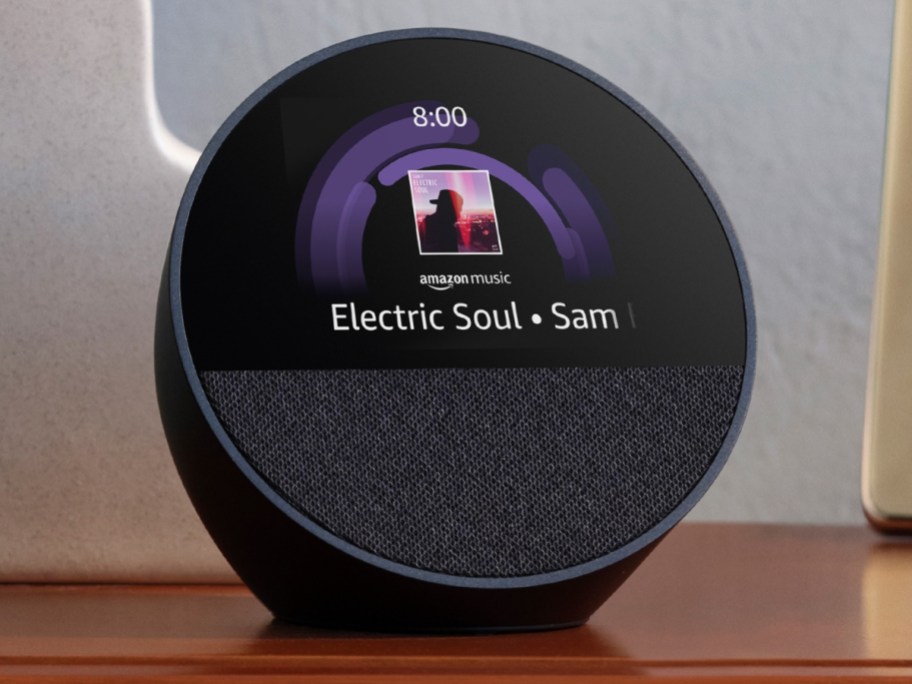 an Amazon Echo Show device with Amazon Music playing on it