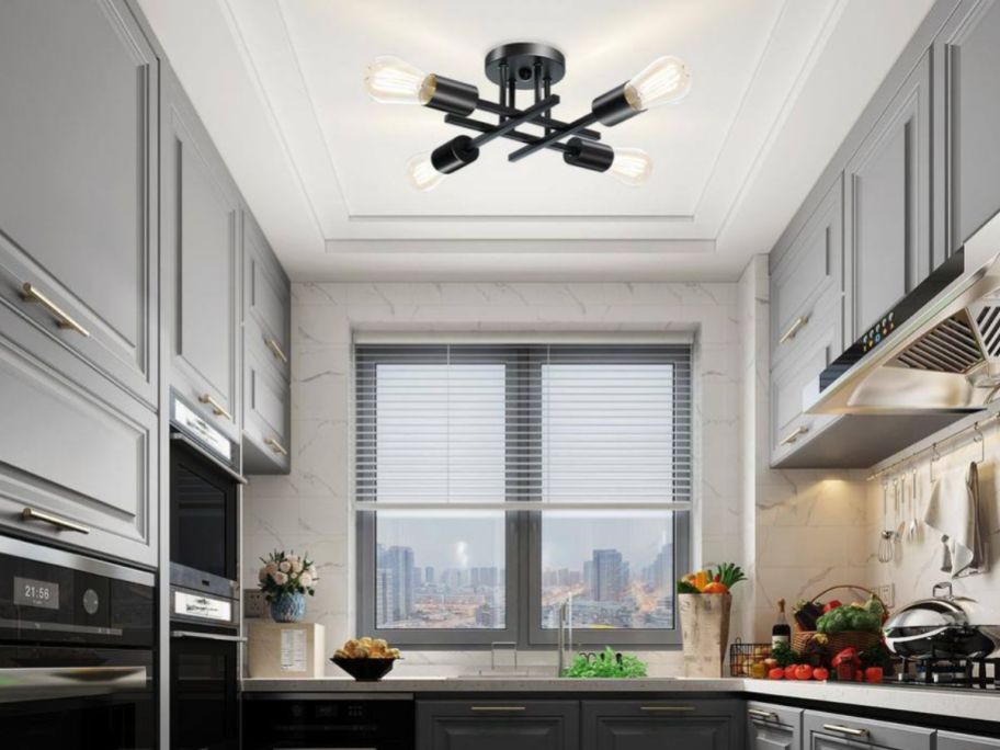A kitchen with a Tozing 16" Black Farmhouse Modern Sputnik Chandelier overhead