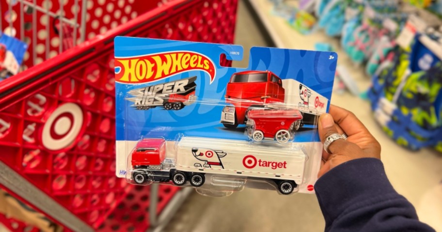 Hot Wheels Bullseye's Big Rig being held in front of a Target cart 