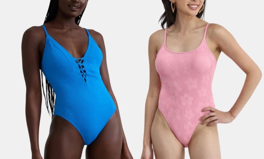 a modelm in a blue one piece swimsuit and a model in a pink one piece swimsuit