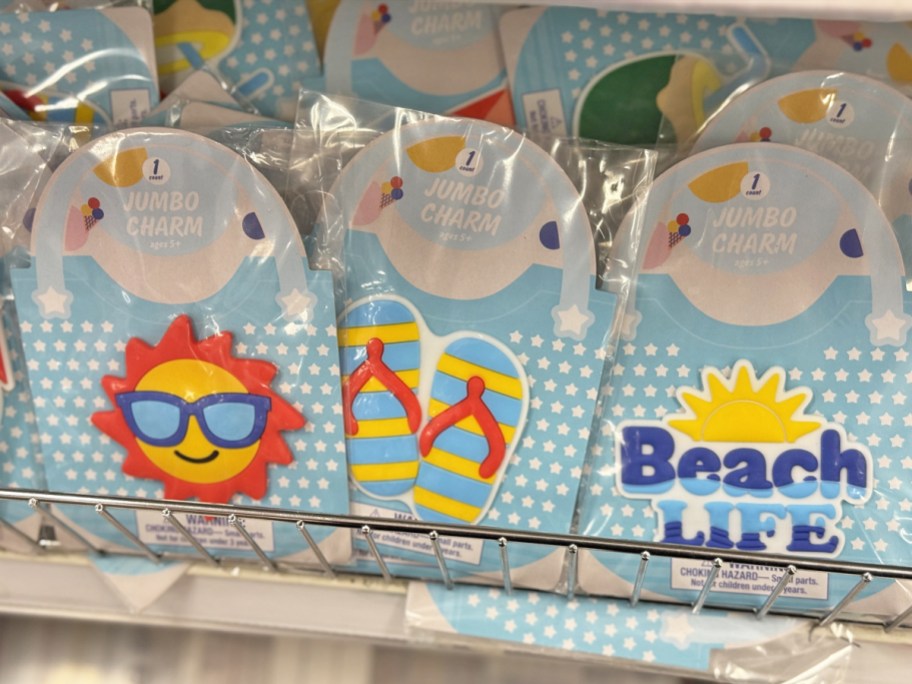 beach bag charms on store display shelf