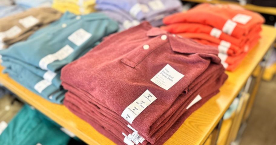 A table of folded Sonoma Goods for Life Men's Polo Shirts