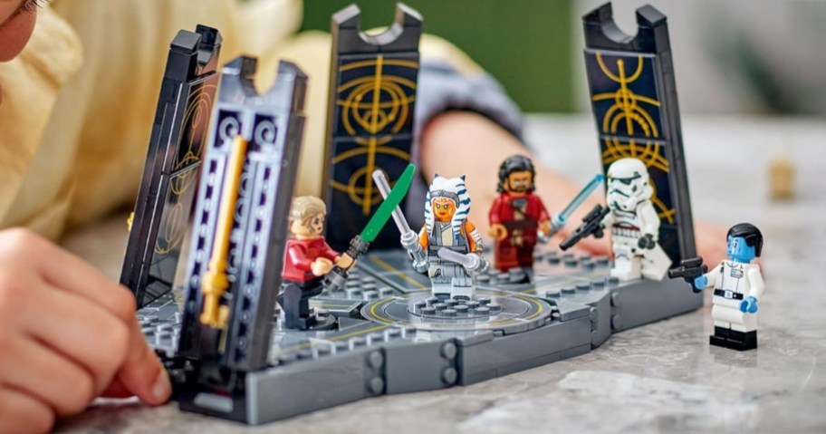 LEGO Star Wars Ahsoka Tano’s Duel on Peridea Building Set being played with by a boy