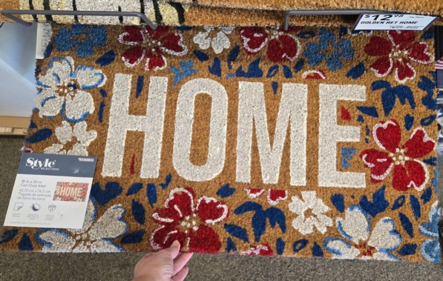 Style Selections Patriotic Floral Doormat with the word HOME on it