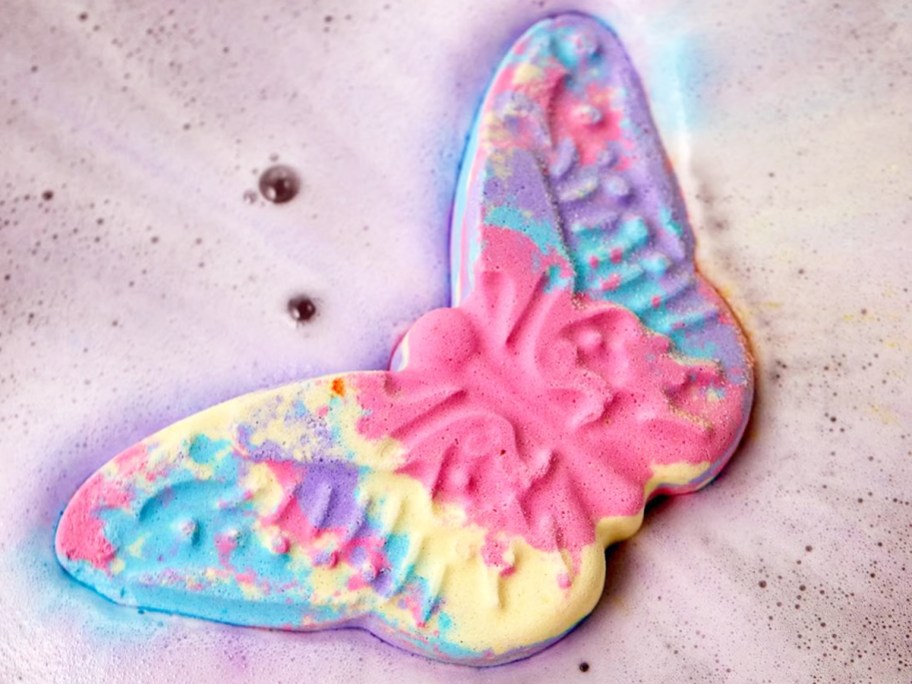 colorful butterfly bath bomb in water