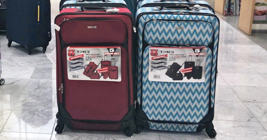 tag 5-piece luggage sets on display in Macy's store