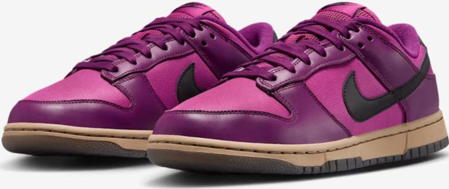 pair of nike sneakers in purple and pink