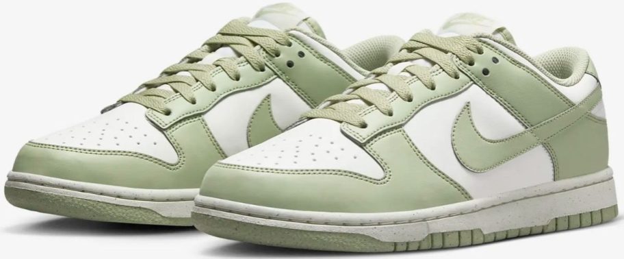 pair of nike sneakers in light green and white