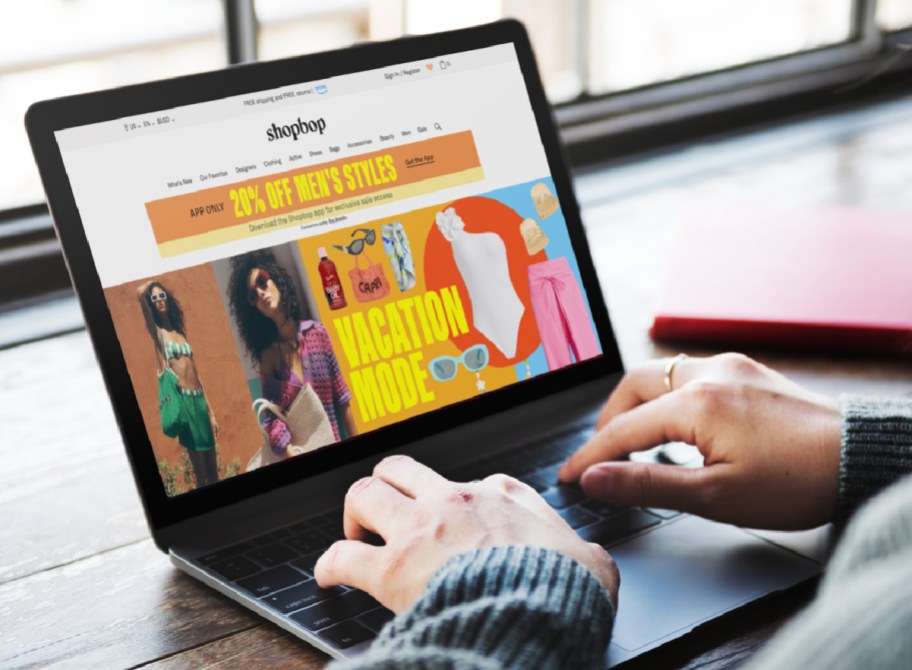 woman using her Amazon prime perks at Shopbop.com