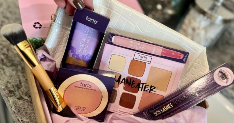 A box filled with Tarte cosmetics
