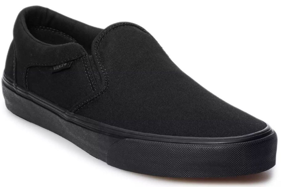 A black Vans slip on shoe
