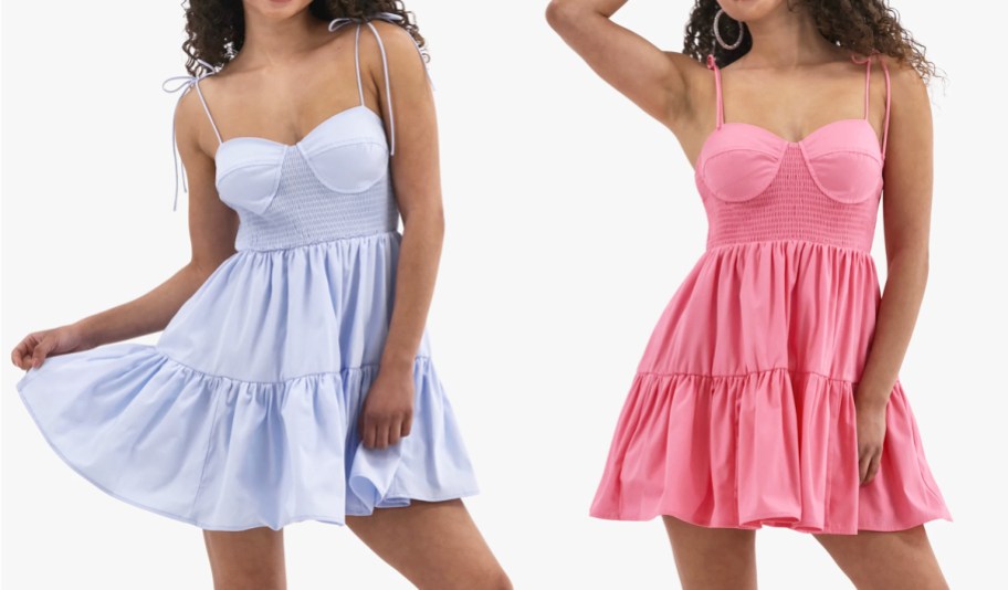 two women in light blue and pink dresses